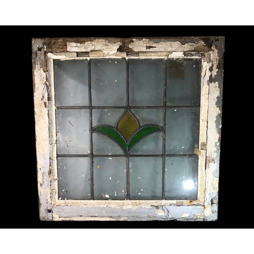 29 - A SET OF 4 RECLAIMED VICTORIAN LEADED LIGHT STAINED WINDOW PANELS.