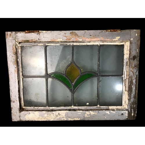 29 - A SET OF 4 RECLAIMED VICTORIAN LEADED LIGHT STAINED WINDOW PANELS.