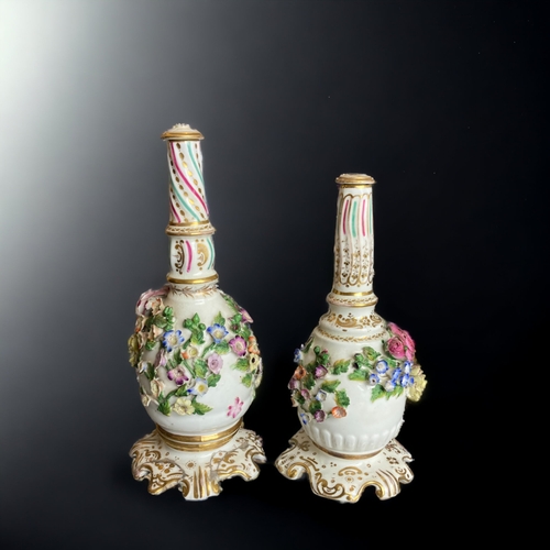 139 - A PAIR OF EARLY 19TH CENTURY PORCELAIN VINAIGRETTE BOTTLES. FOLIATE ENCRUSTED.
TALLEST - 21CM