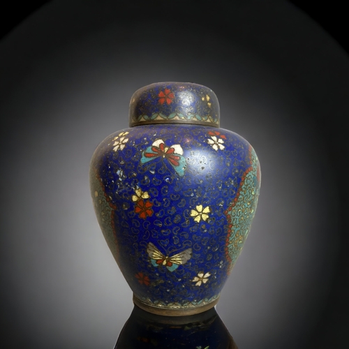 240 - A JAPANESE CLOISONNE LIDDED JAR.
MEIJI PERIOD.
12.5CM TALL