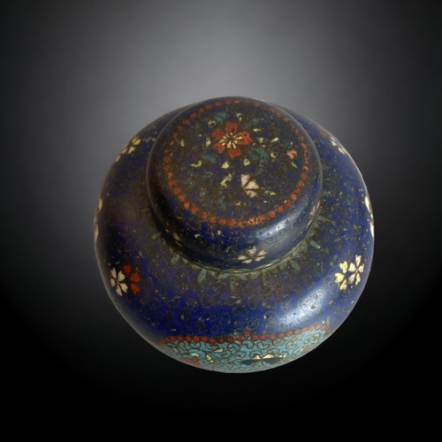 240 - A JAPANESE CLOISONNE LIDDED JAR.
MEIJI PERIOD.
12.5CM TALL