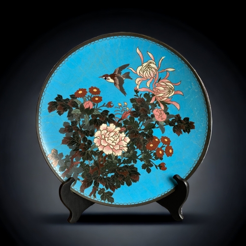 258 - A PAIR OF JAPANESE CLOISONNÉ CHARGERS.
MEIJI PERIOD.
DEPICTING LARGE BLOSSOMING FLOWERS AND A BIRD I... 