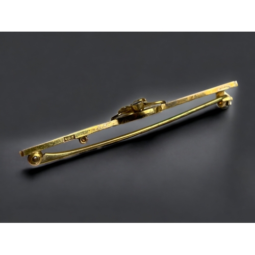 129 - A 9 CARAY GOLD, TANZANITE & SEED PEARL LADIES BROOCH.
57MN LONG
2.8 GRAMS