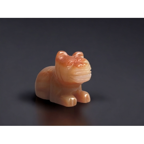 283 - TWO SMALL CHINESE CARVED RUSSET TYPE JADE PIXIU AND MONKEY.
MONKEY - 22 X 20 MM