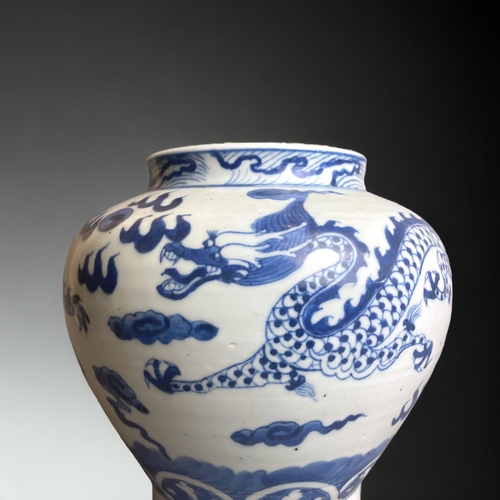 276 - A CHINESE PORCELAIN BALUSTER BLUE & WHITE VASE. HAND PAINTED WITH TWO DRAGONS CHASING PEARL AMONGST ... 