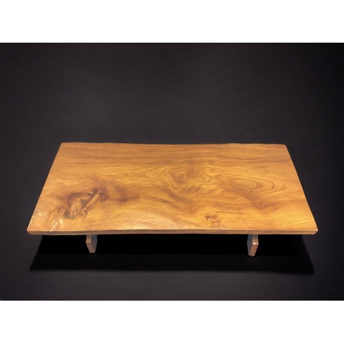 10 - A SOLID ELM TOP COFFEE TABLE.
LYRE ENDS JOINED BY STRETCHER.