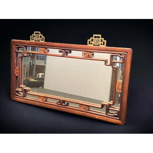 2 - A VINTAGE CHINESE HARDWOOD MIRROR.
WITH CARVED RELIEF BAMBOO DECALS.