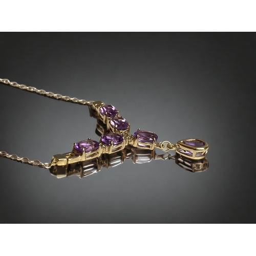 75 - A LADIES 925 SILVER GILT & AMETHYST NECKLACE.