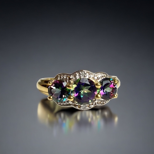 77 - A STERLING SILVER GILT, MYSTIC TOPZ & DIAMOND LADIES RING. MADE BY QUINTESSENCE JEWELLERY.
SIZE N 1/... 