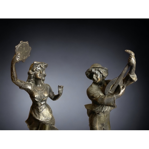 328 - A PAIR OF FRENCH SPELTER 'MUSICIAN' FIGURES.
36CM TALL