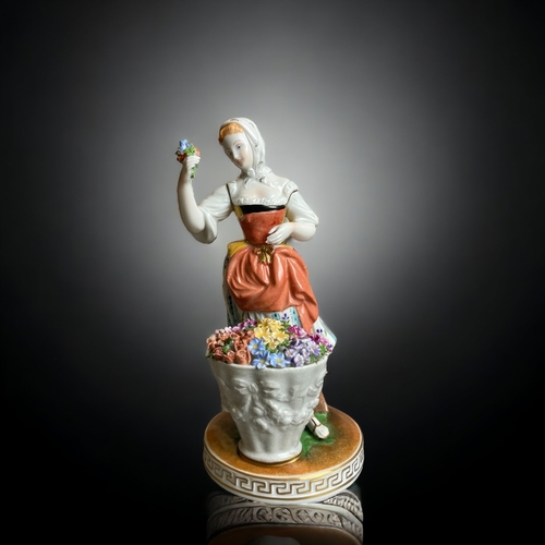 225 - A HAND PAINTED DRESDEN PORCELAIN FIGURE, DEPICTING A 'FLOWER SELLER'. TOGETHER WITH A DRESDEN FLORAL... 