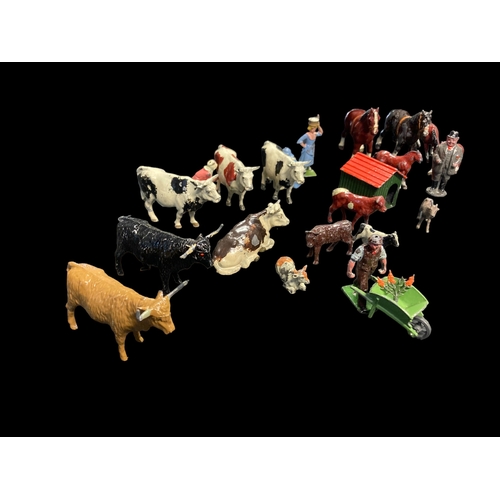 444 - A LARGE COLLECTION OF VINTAGE PAINTED CAST METAL FARMYARD ANIMALS.