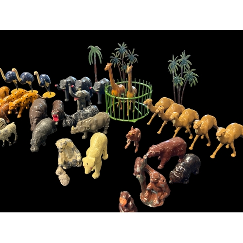 446 - A LARGE COLLECTION OF VINTAGE PAINTED CAST METAL 'ZOO' ANIMALS.