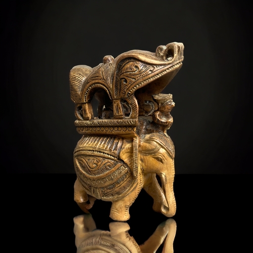 277 - AN INDIAN CARVED WOOD ELEPHANT INCENSE HOLDER. 
13CM TALL