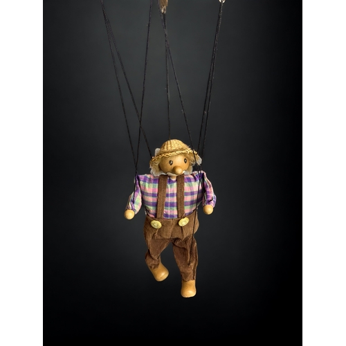 450 - A HAND PAINTED WOODEN STRING PUPPET.