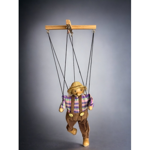 450 - A HAND PAINTED WOODEN STRING PUPPET.