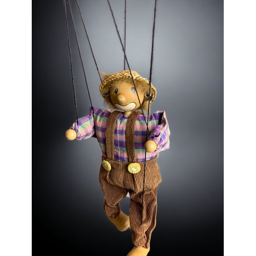 450 - A HAND PAINTED WOODEN STRING PUPPET.