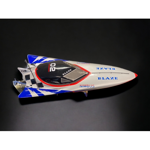 451 - A LARGE BOXED DRAGON BLAZE B-24 REMOTE CONTROL SPEED BOAT. 
65CM LONG.