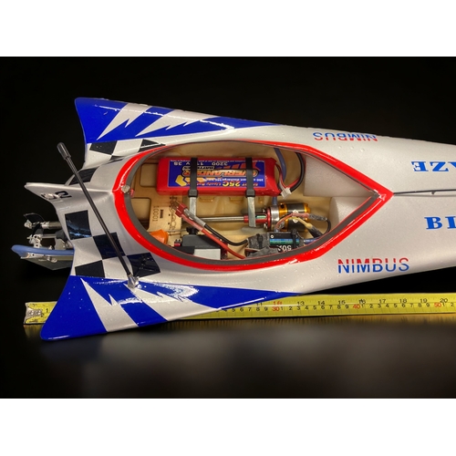 451 - A LARGE BOXED DRAGON BLAZE B-24 REMOTE CONTROL SPEED BOAT. 
65CM LONG.