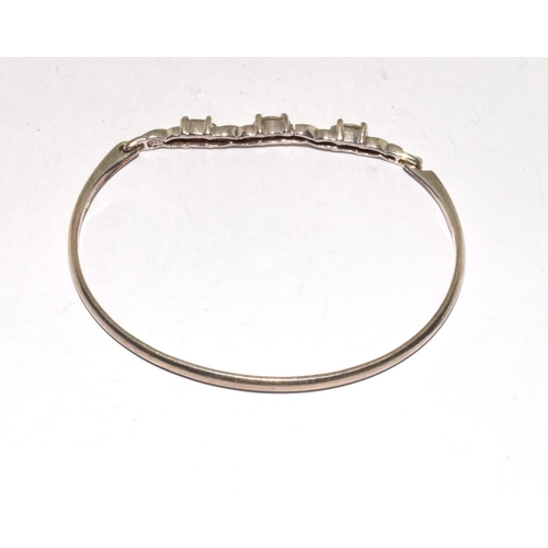 181 - 925 silver solid bangle with 3 stone decoration together a stone set similar bracelet