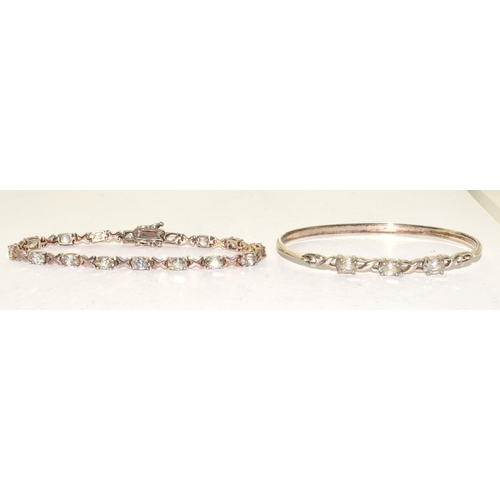 181 - 925 silver solid bangle with 3 stone decoration together a stone set similar bracelet