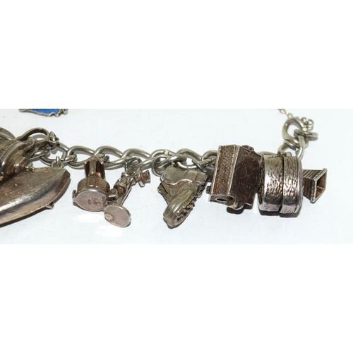 108 - 925 silver charm bracelet and charms approx 20 80g