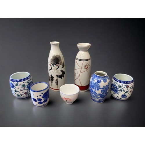 287 - A COLLECTION OF JAPANESE PORCELAIN. INCLUDING SAKE BOTTLES, VASES & CUPS.