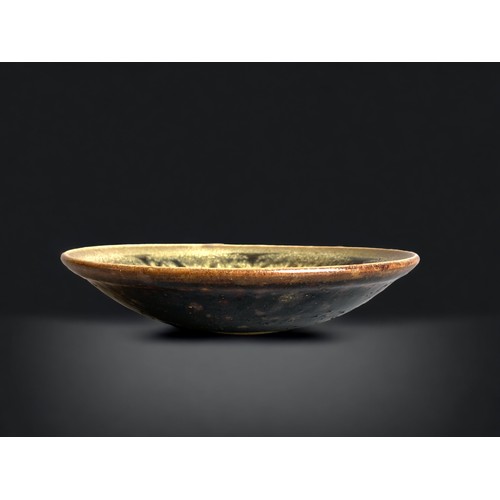 258 - A CHARLES VYSE STUDIO POTTERY BOWL.
DECORATED IN JIZHOU TYPE GLAZE WITH A STYLISED FOLIATE DESIGN.
S... 