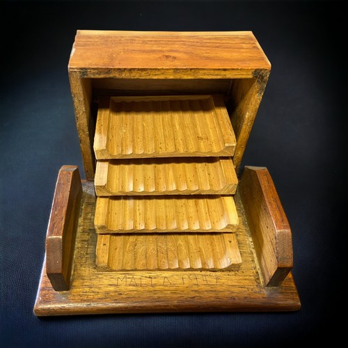 366 - A COLLECTION OF WOOD & BAKELITE CIGAR & CIGARETTE BOXES. TOGETHER WITH TWO PAIRS OF CANDLESTICKS.