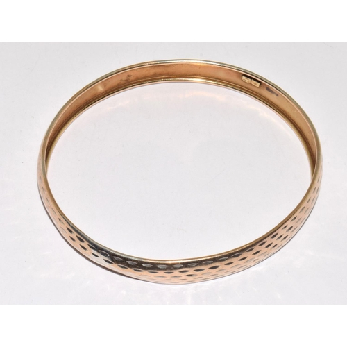 201 - 925 silver solid bangle with embossed decoration