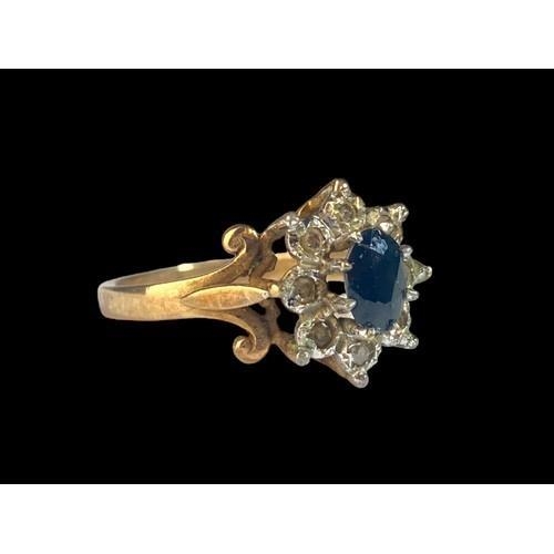 177 - A 9ct Gold Ladies Diamond & Sapphire Cluster Ring. H/M Dia in ring. Size M