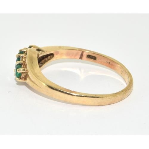 173 - 9ct gold ladies Emerald and Diamond ring size S