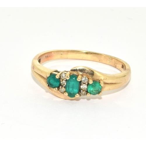 173 - 9ct gold ladies Emerald and Diamond ring size S