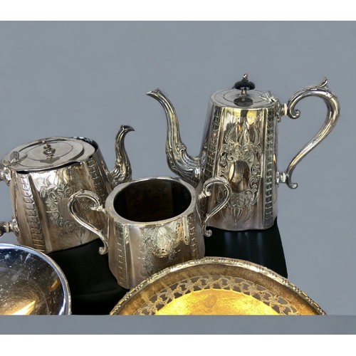 143 - A LARGE LOT OF SILVER PLATE WARES, INCLUDING A TEA SET, CONDIMENTS, SERVER, TAZZA & EWER.