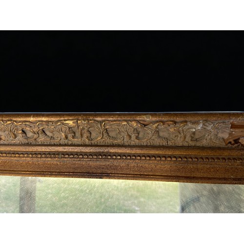 15 - A LARGE VINTAGE GILT GESSO MIRROR.
34