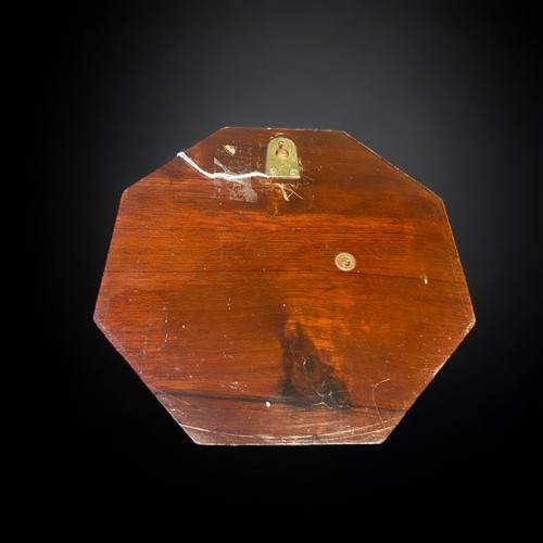 325 - AN EDWARDIAN INLAID BAROMETER .
OCTAGONAL FORM.
RETAILED BY T.T JOHNSON OF SALISBURY.
8.5