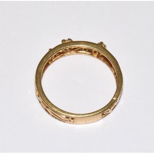 119 - 9ct gold ladies open work ring set with Diamonds size M