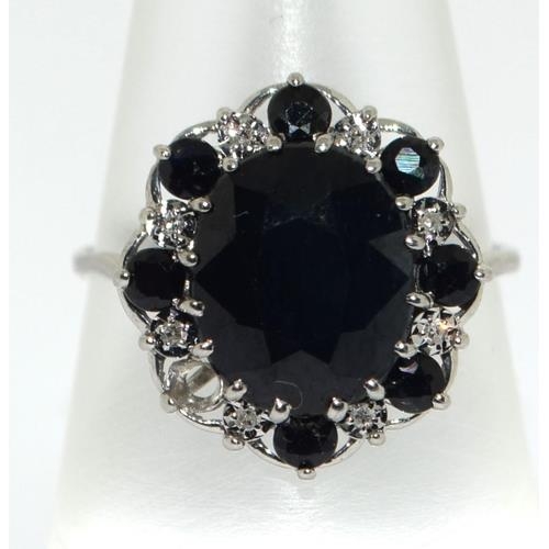 115 - 9ct white gold ladies Sapphire cluster ring size M