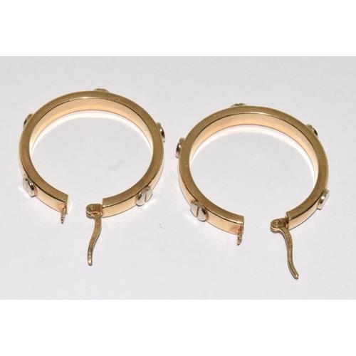 178 - 9ct gold ladies round hoop earrings in the Cartier love style 30mm