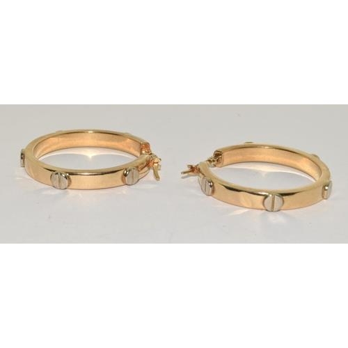 178 - 9ct gold ladies round hoop earrings in the Cartier love style 30mm