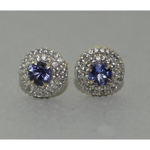 136 - A pair of  9ct gold Tanzanite and Zircon earrings.