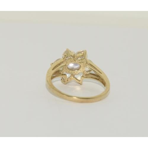 271 - 9ct Gold moonstone amethyst ring. Size N 1/2.