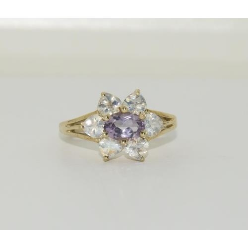 271 - 9ct Gold moonstone amethyst ring. Size N 1/2.