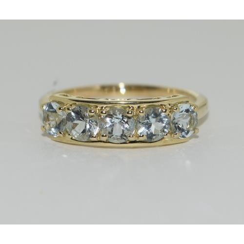 96 - A 9ct gold aquamarine 5 stone ring Size N