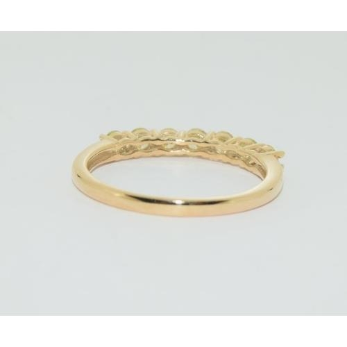 300 - 9ct Gold 7 stone yellow diamond 1/2 eternity ring, N