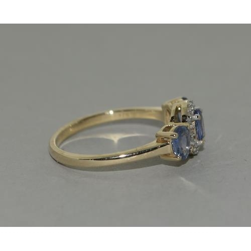 259 - A 9ct gold Ceylon Sapphire and Diamond ring Size N