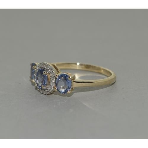 259 - A 9ct gold Ceylon Sapphire and Diamond ring Size N