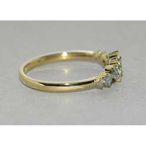 293 - A 9ct gold blue and white diamond ring. Size P