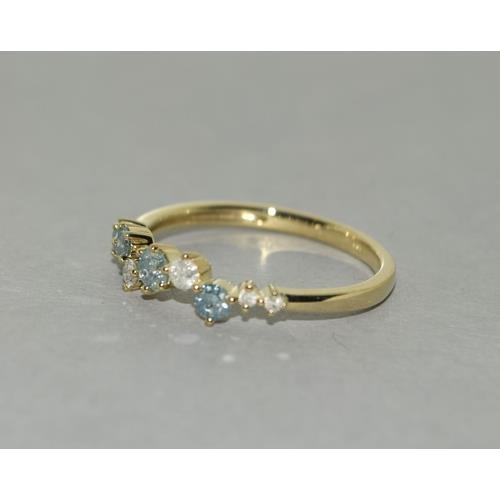 293 - A 9ct gold blue and white diamond ring. Size P