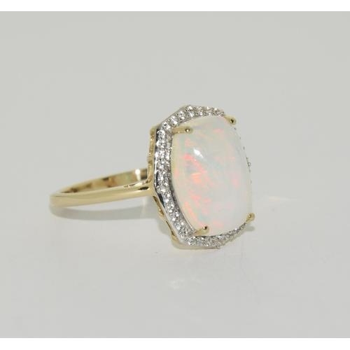 193 - 9ct Gold Opal white sapphire ring. Size T 1/2.